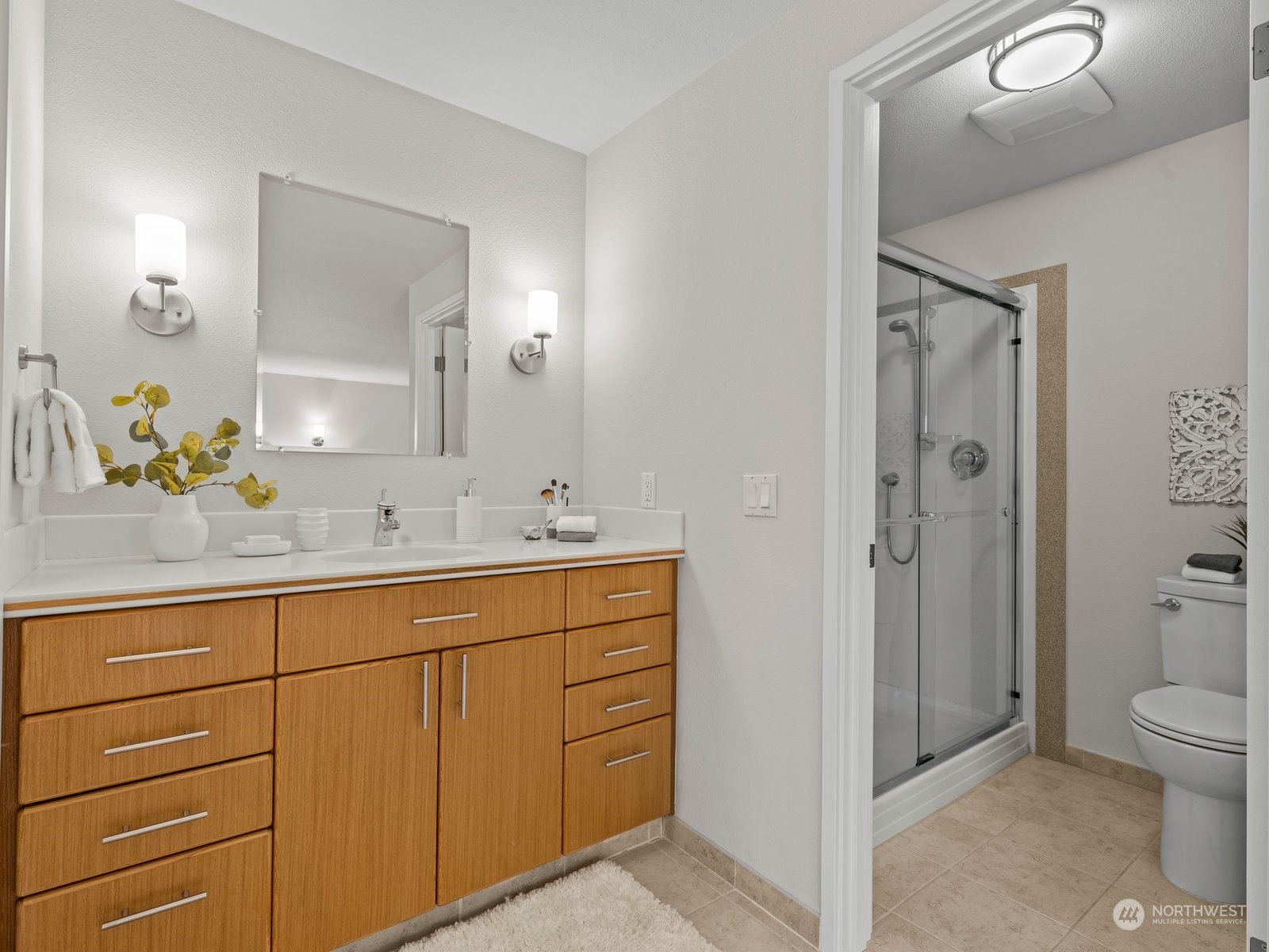 750 Northstream Lane Edmonds, WA 98020 - Photo 25 of 37 a bathroom with a sink a toilet and shower