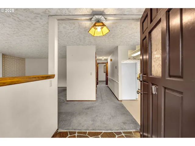 a view of hallway with stairs