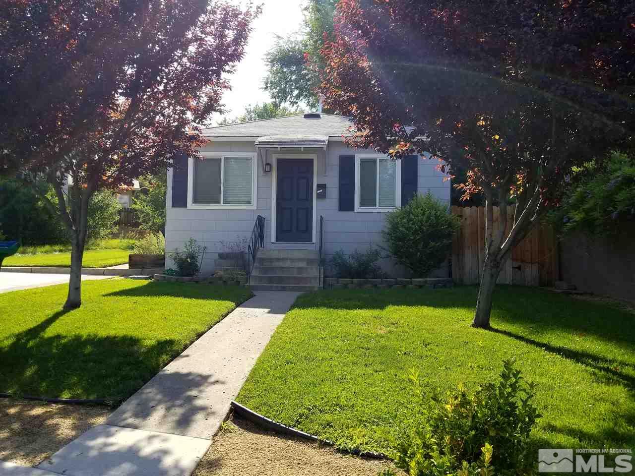 1261-1265 Seminary Avenue Reno, NV 89503 - Photo 1 of 1 front view of a house with a yard
