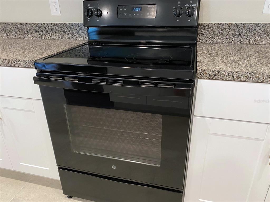 3816 Hanover Drive New Port Richey, FL 34653 - Photo 11 of 64 a close view of stove