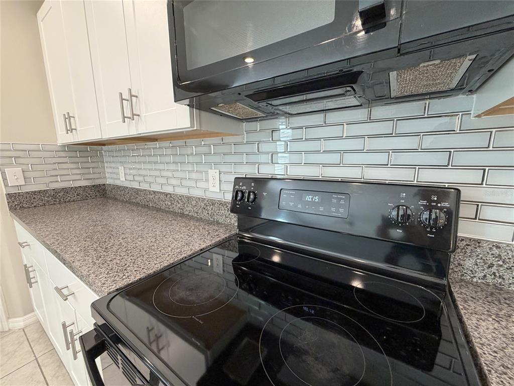 3816 Hanover Drive New Port Richey, FL 34653 - Photo 12 of 64 a close view of stove