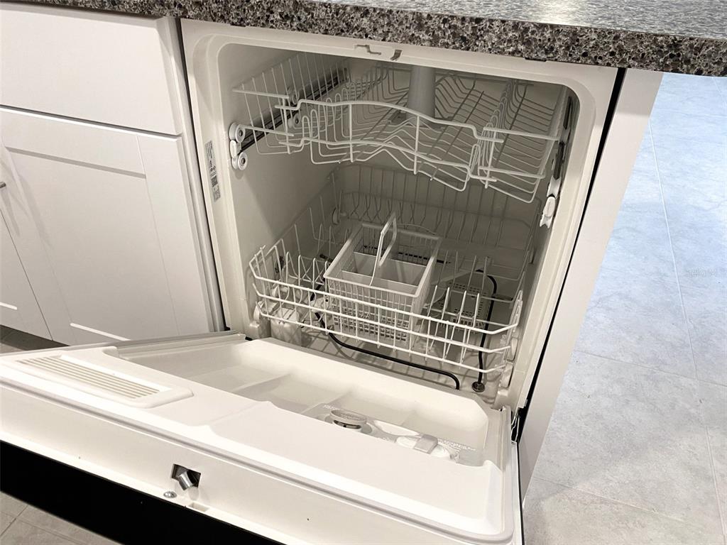 3816 Hanover Drive New Port Richey, FL 34653 - Photo 18 of 64 a bathroom with a sink and mirror