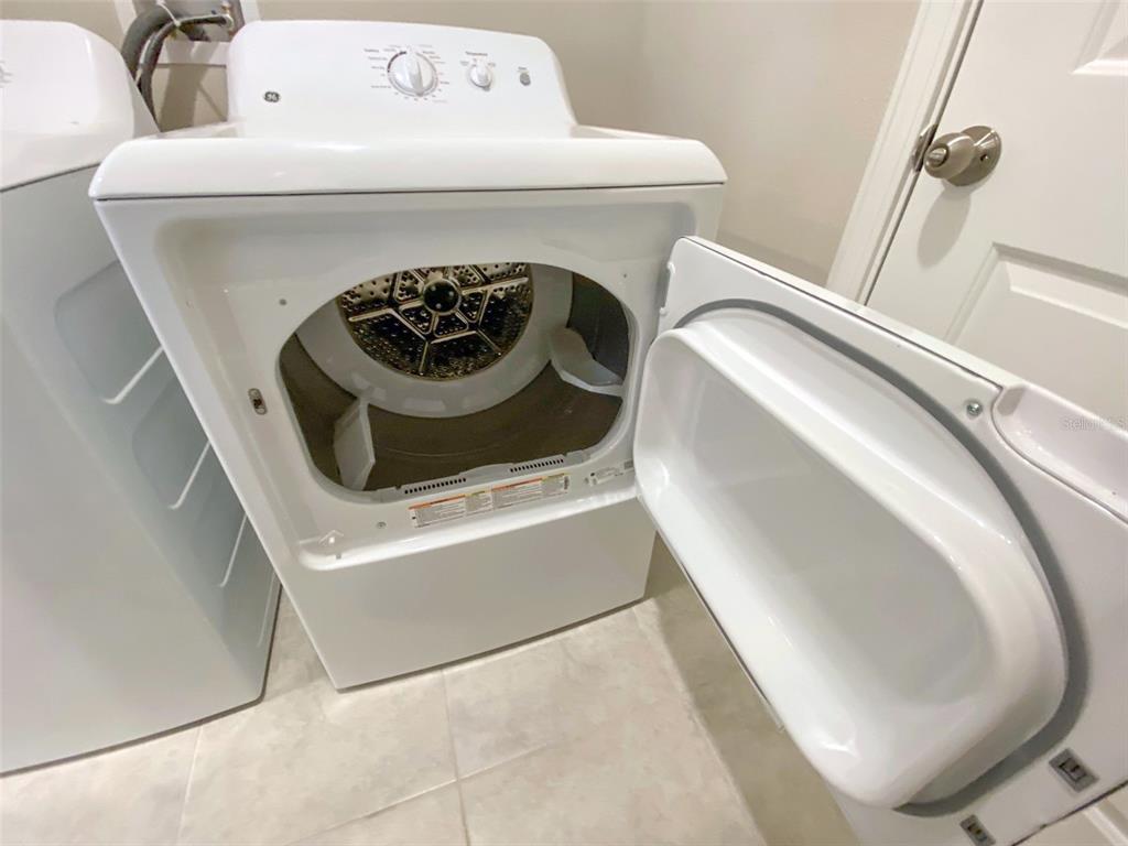 3816 Hanover Drive New Port Richey, FL 34653 - Photo 37 of 64 a utility room with dryer and washer