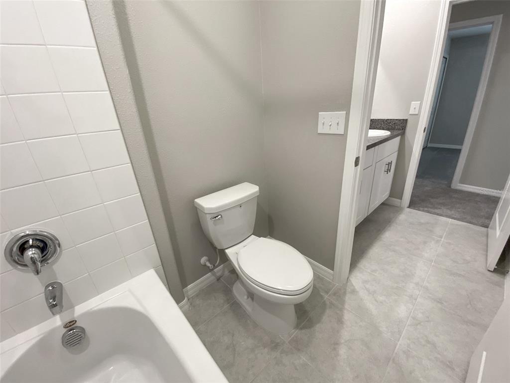 3816 Hanover Drive New Port Richey, FL 34653 - Photo 41 of 64 a bathroom with a sink and toilet