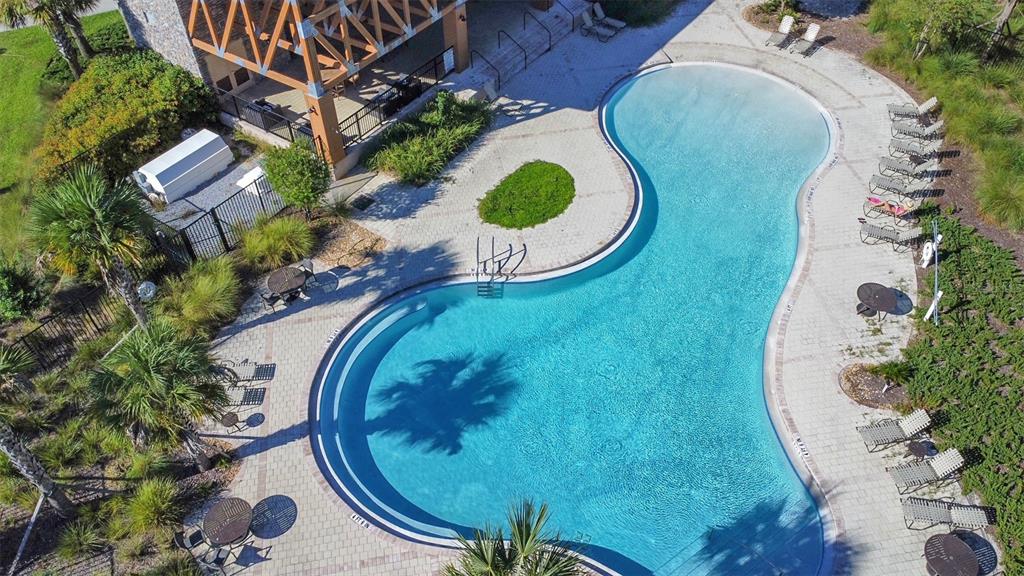 3816 Hanover Drive New Port Richey, FL 34653 - Photo 56 of 64 an aerial view of a house with garden space and swimming pool