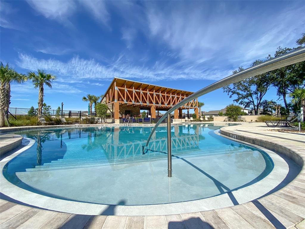 3816 Hanover Drive New Port Richey, FL 34653 - Photo 59 of 64 swimming pool view with a outdoor space