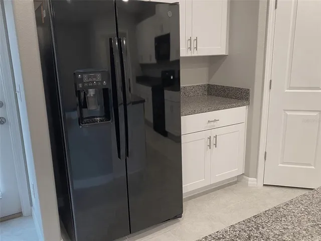 a view of a bathroom with a glass door