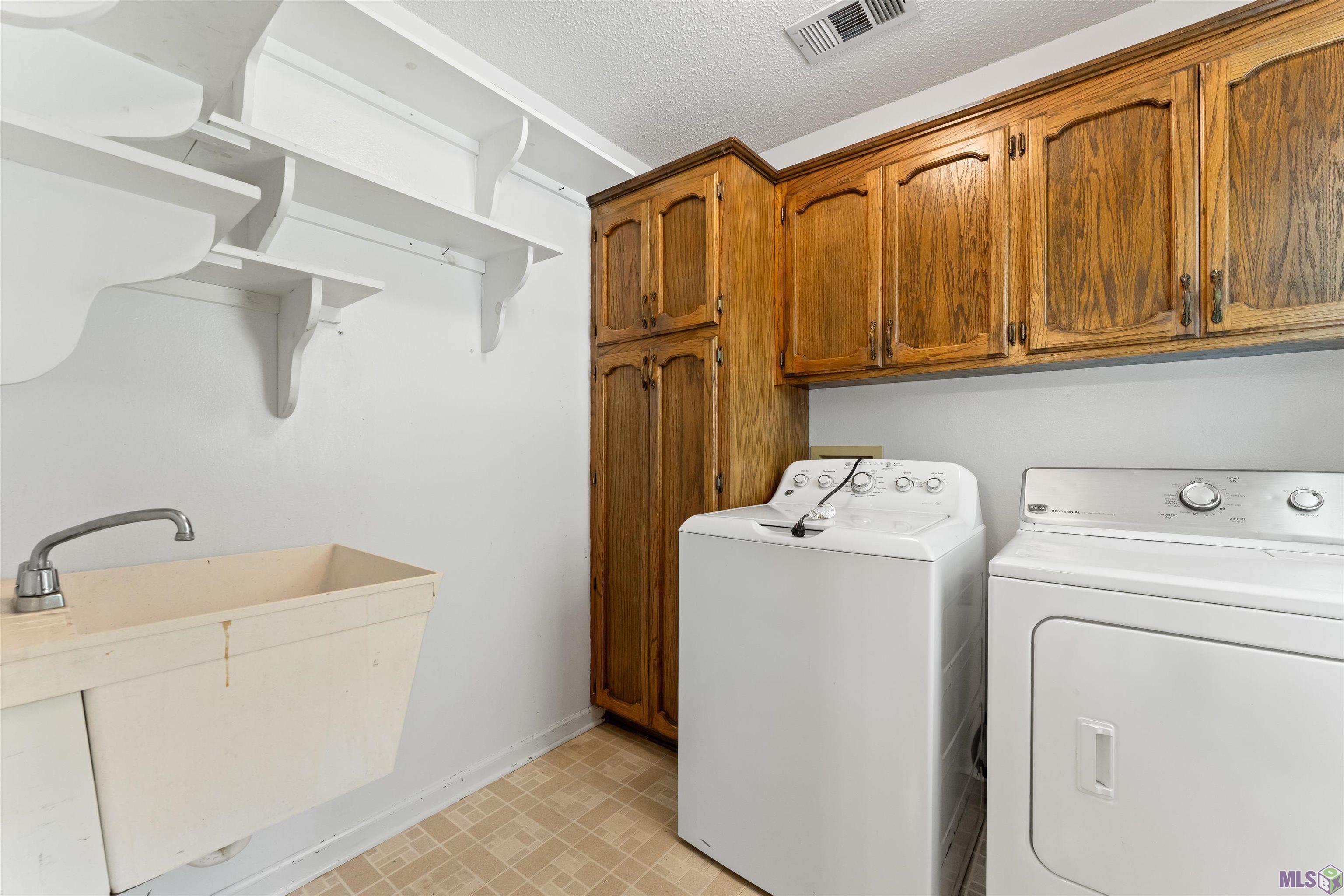 15035 Crystal Drive Pride, LA 70770 - Photo 8 of 25 Laundry Room