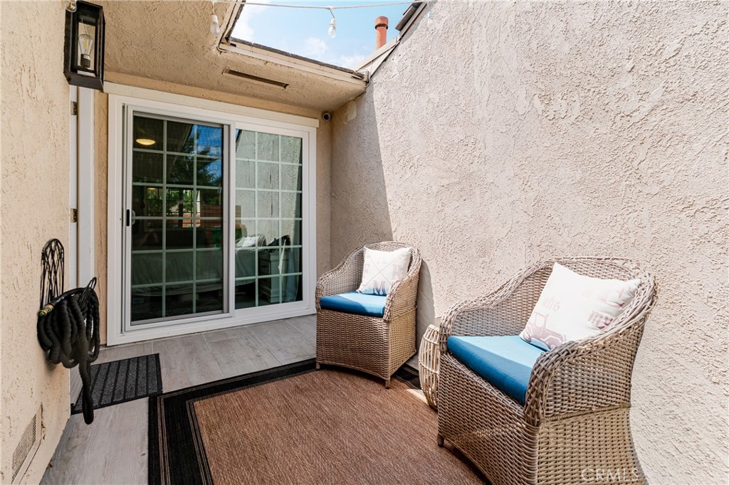 12 Juniper Irvine, CA 92612 - Photo 26 of 26 a living room with furniture and a window