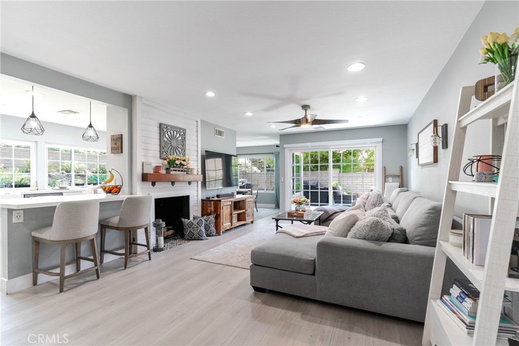 12 Juniper Irvine, CA 92612 - Photo 5 of 26 a living room with furniture and a large window