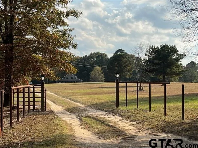 a view of a yard with lake view