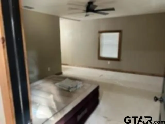 a view of a hallway to a room