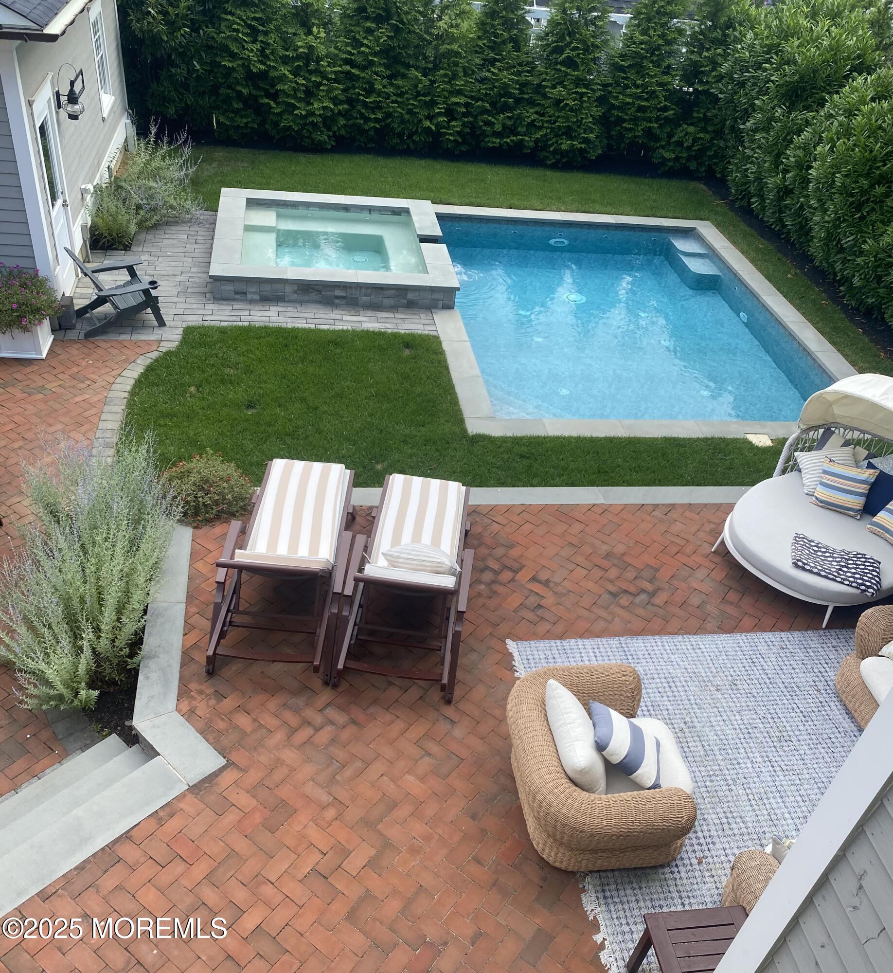 409 Ocean Road Spring Lake, NJ 07762 - Photo 2 of 31 409 Ocean Overhead Pool & Patio