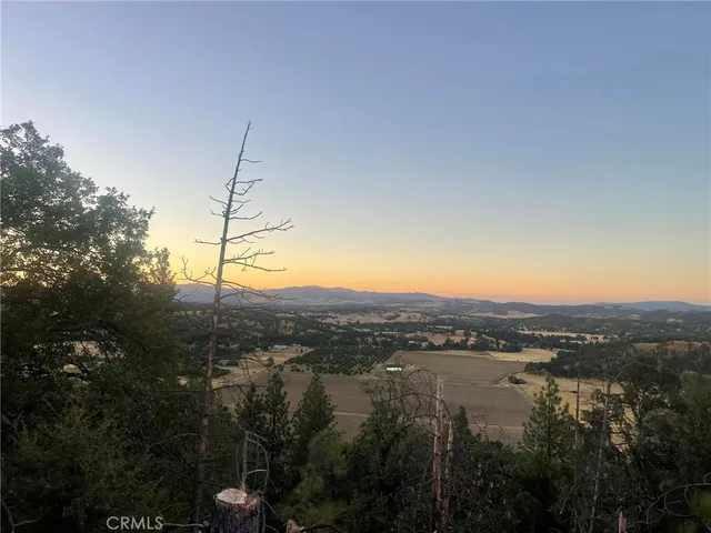 a view of lake and mountain