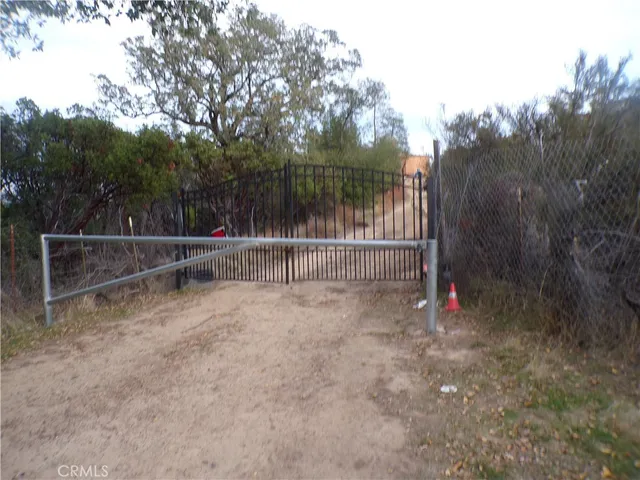 a view of backyard with trampoline