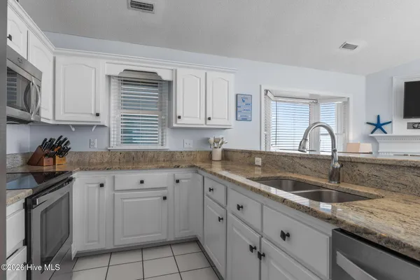 $1,395,000 | 5307 Ocean Drive, Unit EAST, Emerald Isle, NC 28594
