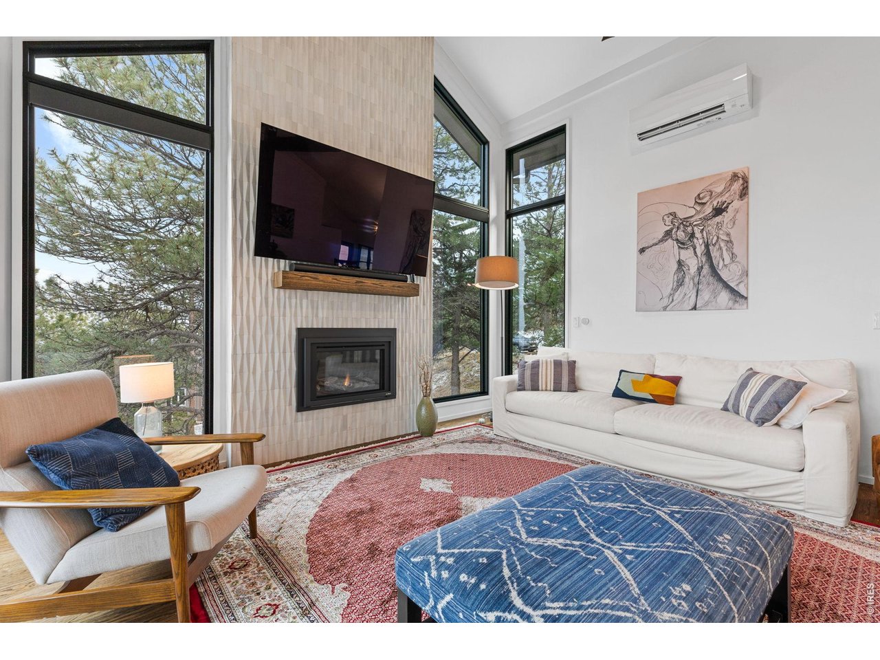 93 Hawk Lane Boulder, CO 80304 - Photo 10 of 50 Floor-to-ceiling fireplace tile surround