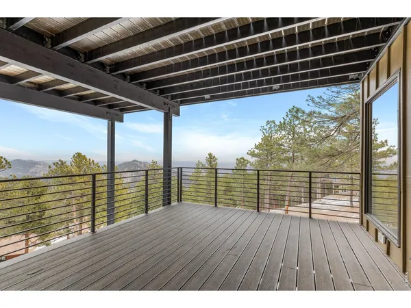 a view of deck with city view