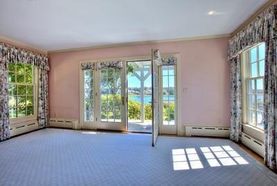 120 North Bay Road Osterville, MA 02655 - Photo 11 of 21 a view of an empty room with floor to ceiling windows