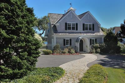 120 North Bay Road Osterville, MA 02655 - Photo 13 of 21 a front view of a house with a yard