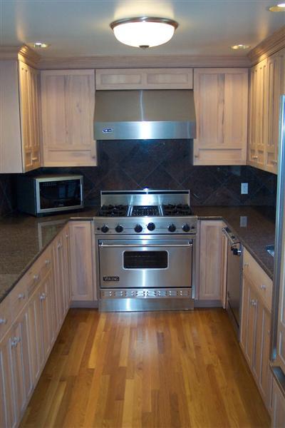 120 North Bay Road Osterville, MA 02655 - Photo 15 of 21 a kitchen with stainless steel appliances granite countertop a stove a sink and a microwave