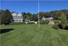 120 North Bay Road Osterville, MA 02655 - Photo 17 of 21 a view of a big yard with a house in the background