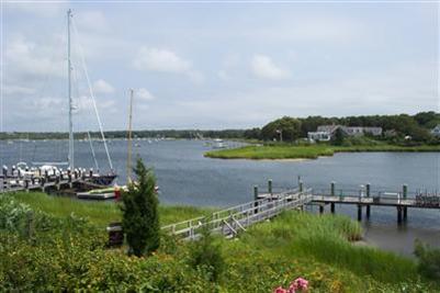 120 North Bay Road Osterville, MA 02655 - Photo 2 of 21 a view of a lake with houses in the back