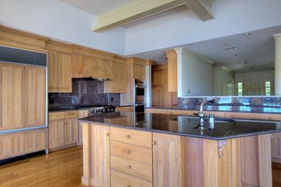 120 North Bay Road Osterville, MA 02655 - Photo 9 of 21 a kitchen with stainless steel appliances granite countertop a sink and a refrigerator