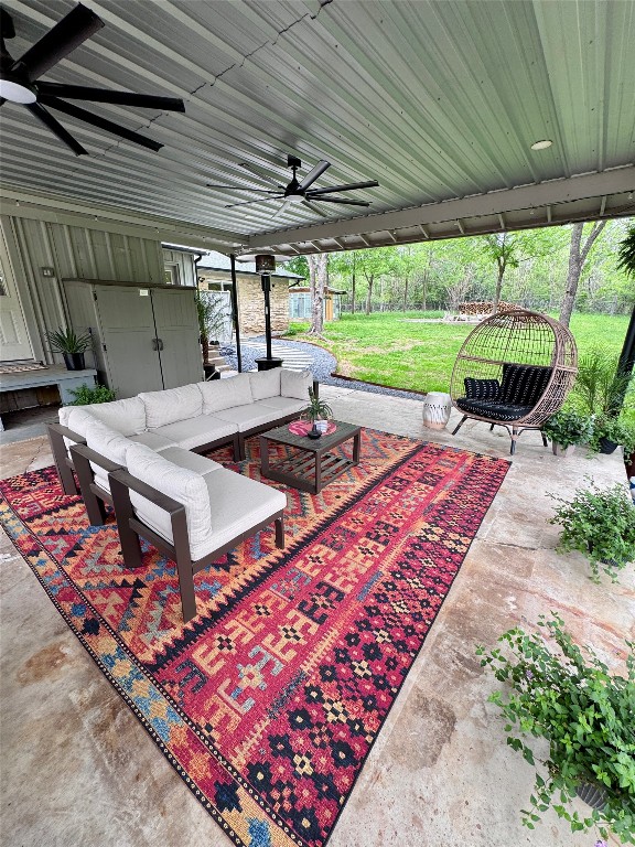 6011 Nuckols Crossing Road Austin, TX 78744 - Photo 6 of 24 View of patio with ceiling fan and an outdoor hangout area