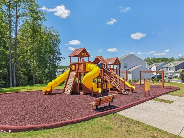 a view of a house with a park