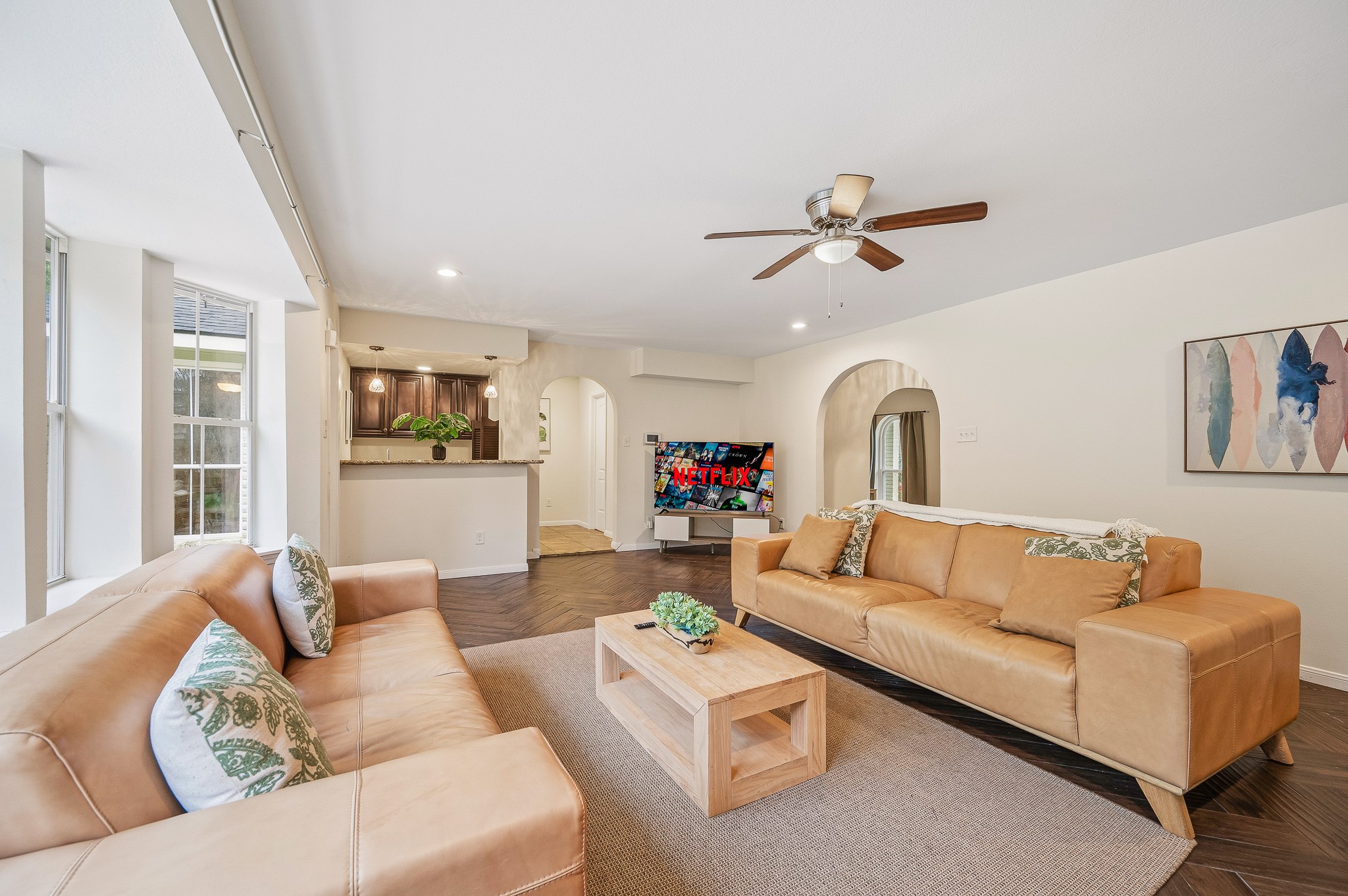 16811 Waycreek Road Houston, TX 77068 - Photo 29 of 50 a living room with furniture ceiling fan and a rug