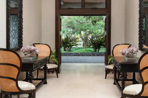 a view of a dining room with furniture and window
