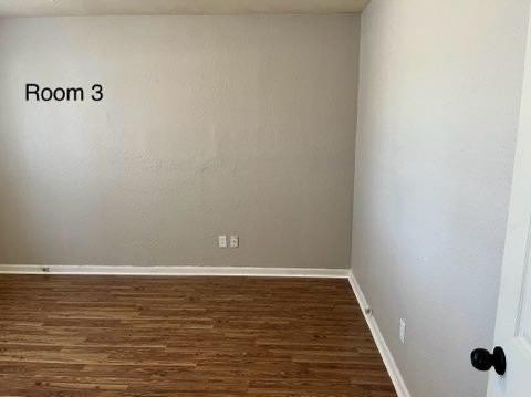 2101 35th Street Lubbock, TX 79412 - Photo 11 of 12 a view of an empty room with wooden floor