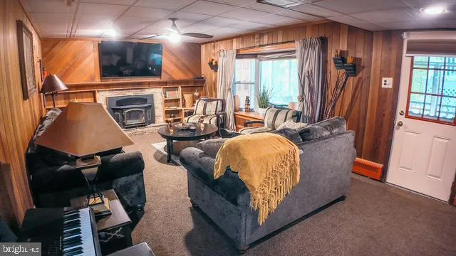 a outdoor space with patio the couches and a potted plant on the table