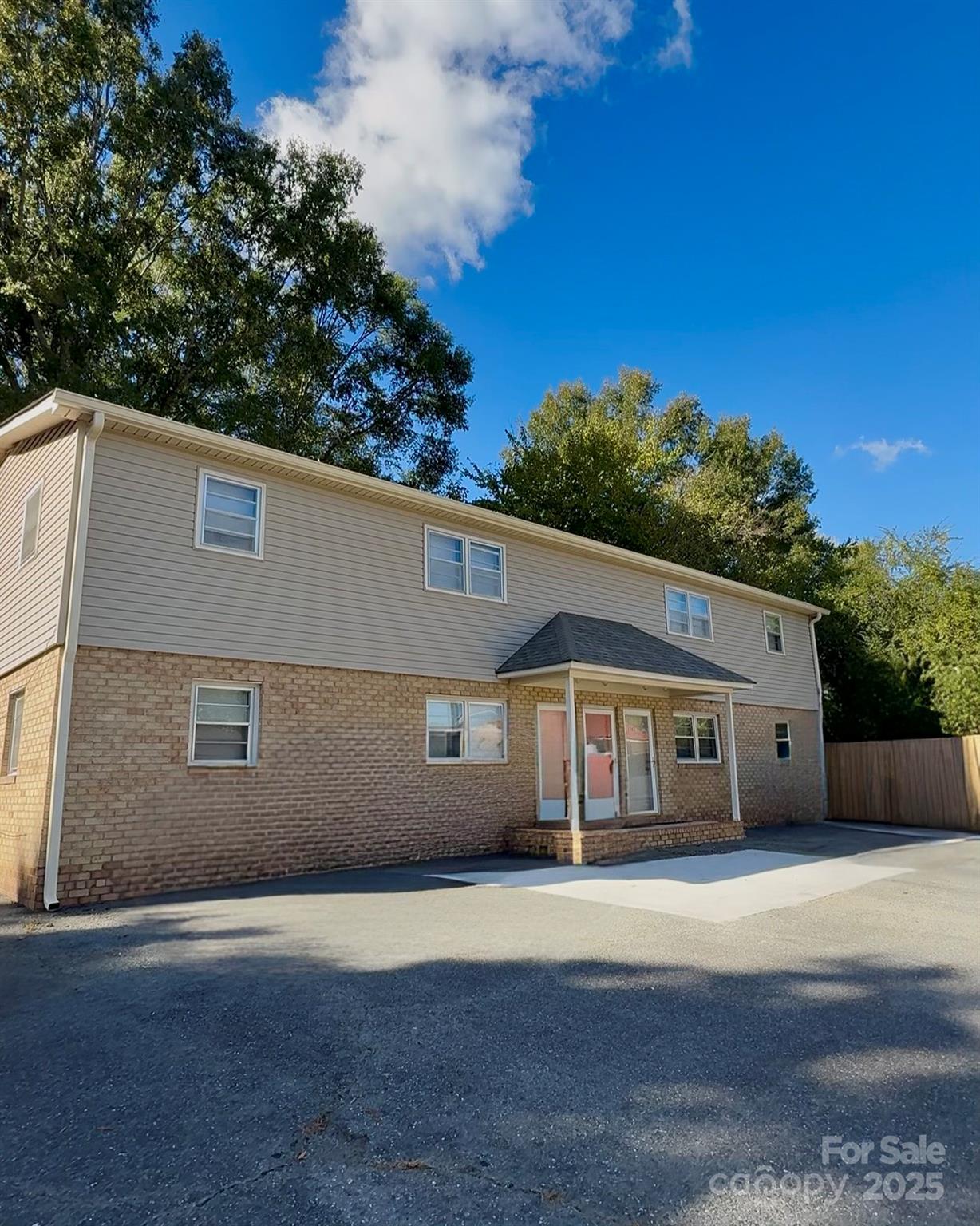 a house view with a garden space