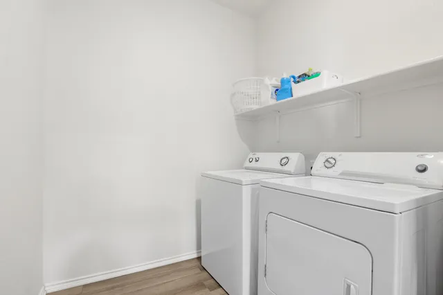a utility room with dryer and washer