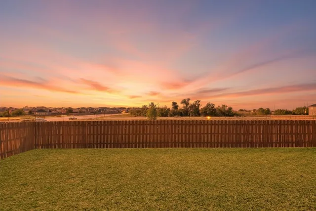 a view of an ocean with a mountain view