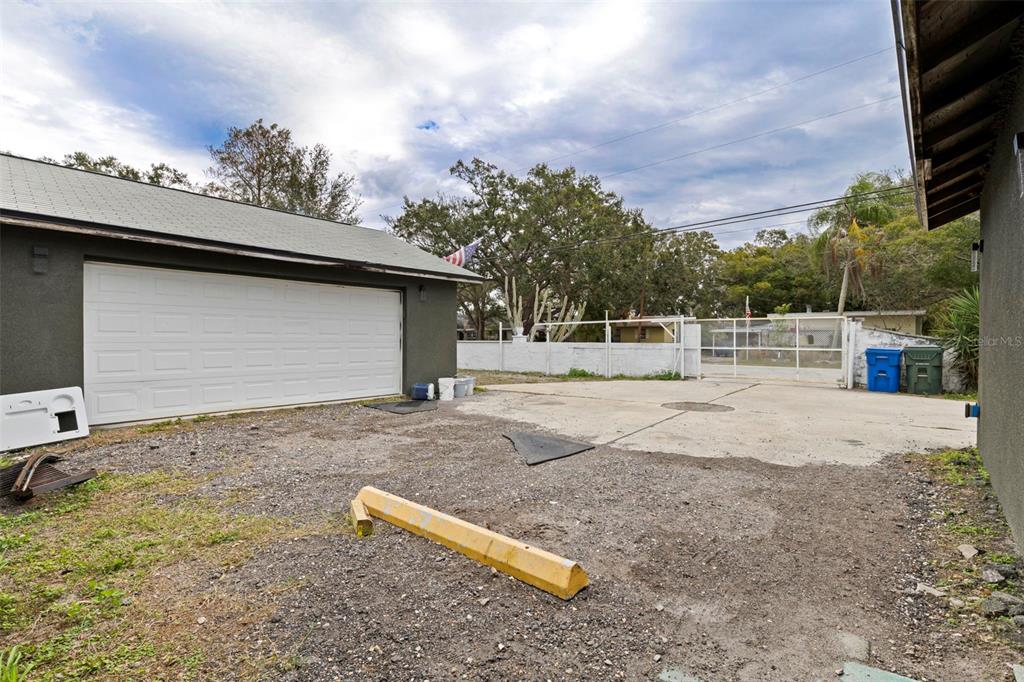 649 16th Street Northwest Largo, FL 33770 - Photo 5 of 42 a backyard of a house with lots of green space