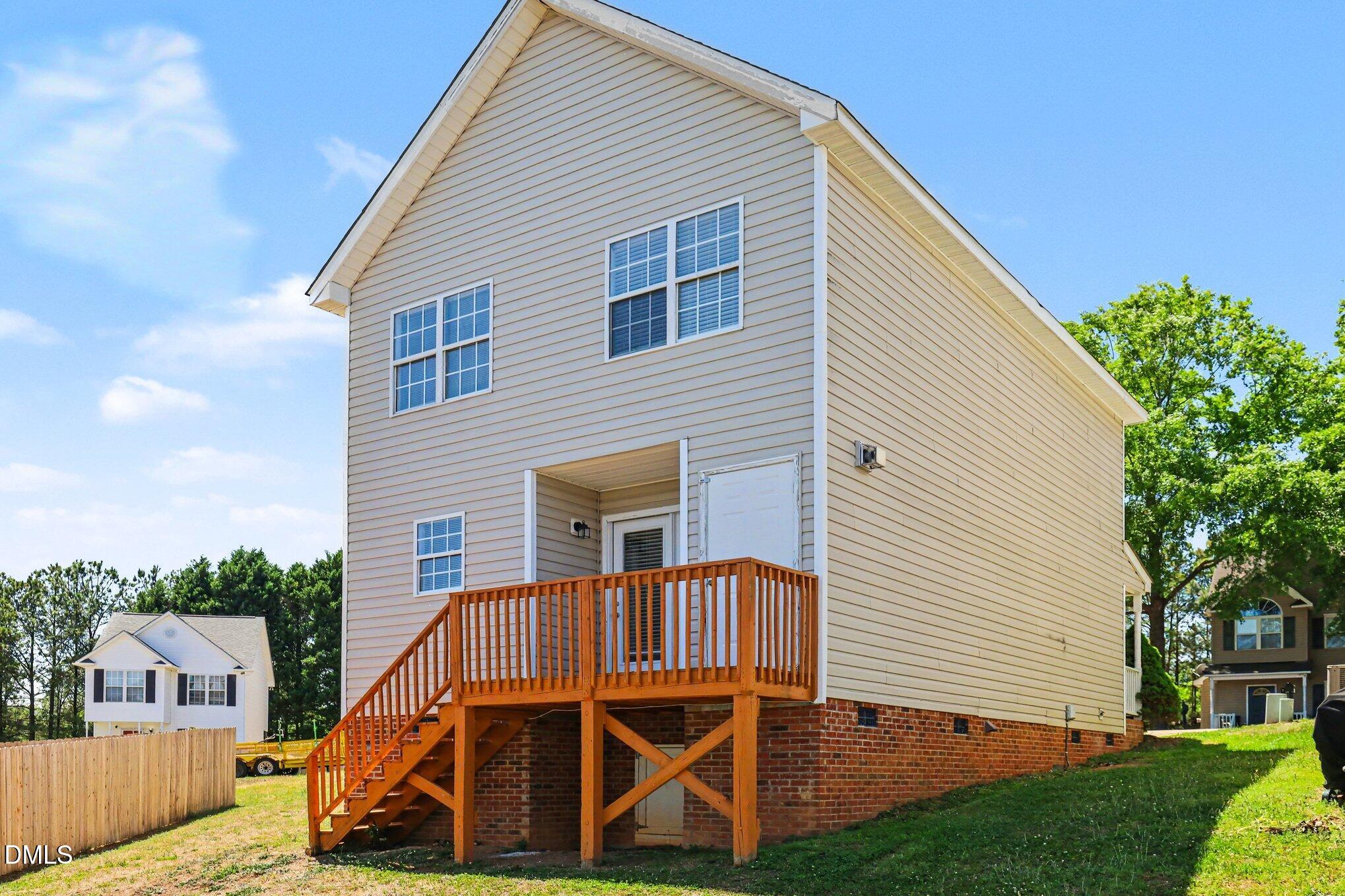 4816 Windbreak Lane Raleigh, NC 27616 - Photo 17 of 17 a view of a house with a yard