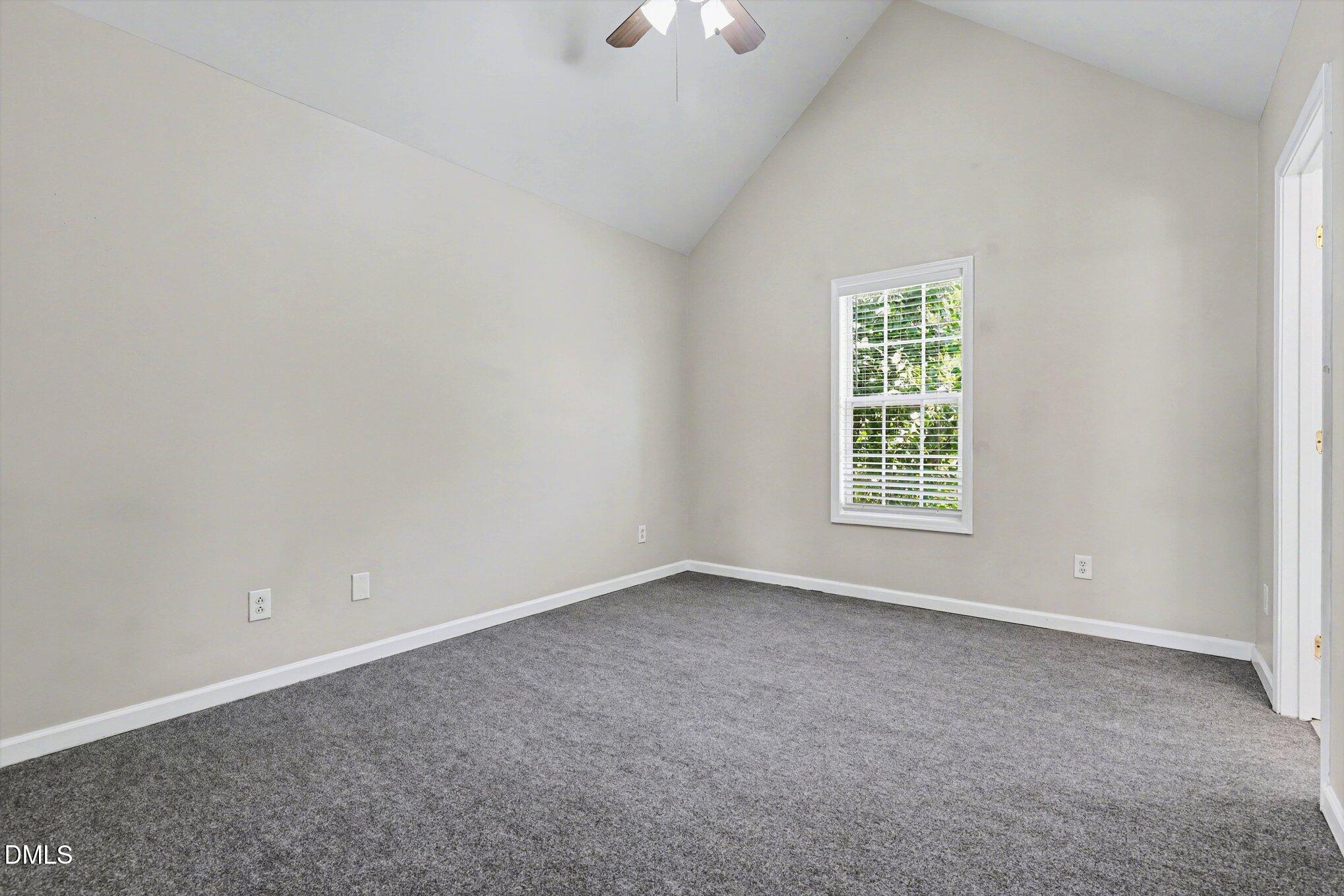 4816 Windbreak Lane Raleigh, NC 27616 - Photo 10 of 17 an empty room with a window