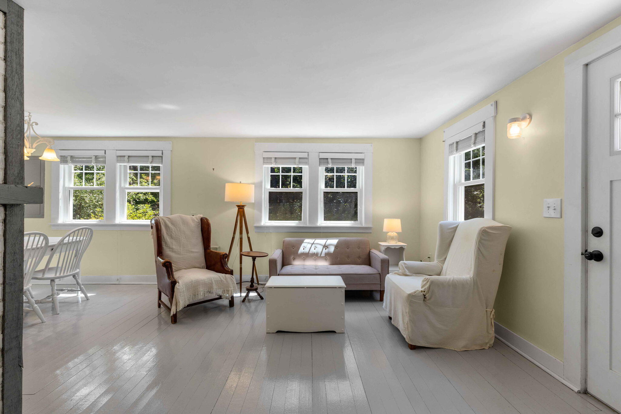 11 Whitmanville Road Truro, MA 02666 - Photo 11 of 31 a living room with furniture and a large window