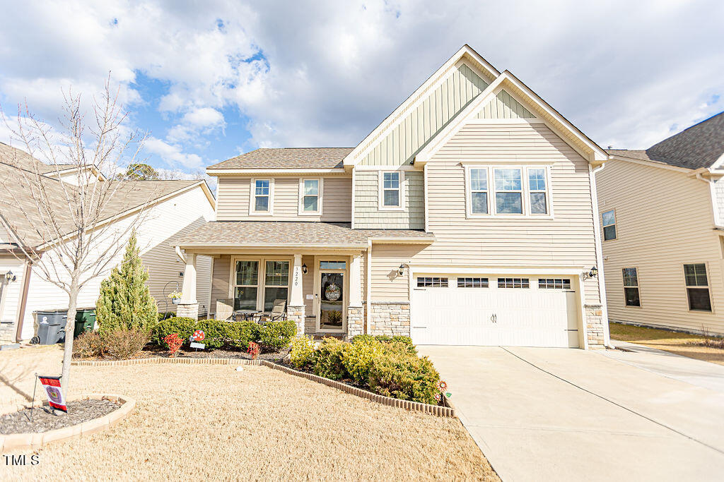 3220 Lacewing Drive Zebulon, NC 27597 - Photo 1 of 69 a front view of a house with a yard
