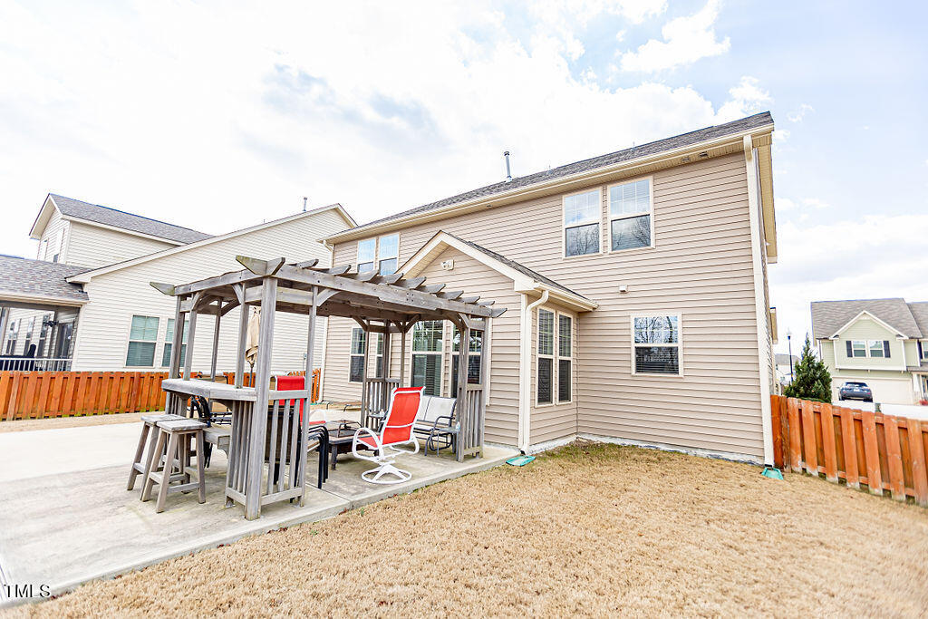 3220 Lacewing Drive Zebulon, NC 27597 - Photo 55 of 69 a view of a chairs and tables in patio