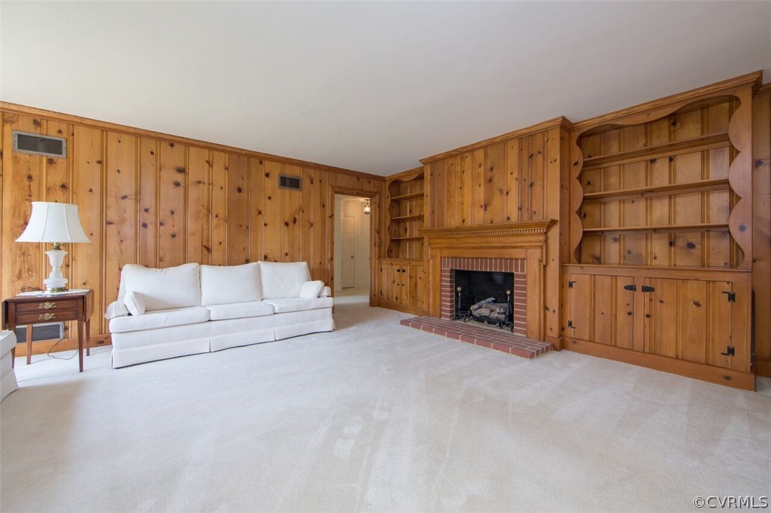 815 Northampton Road Petersburg, VA 23805 - Photo 6 of 20 Living room with custom built in storage cabinets