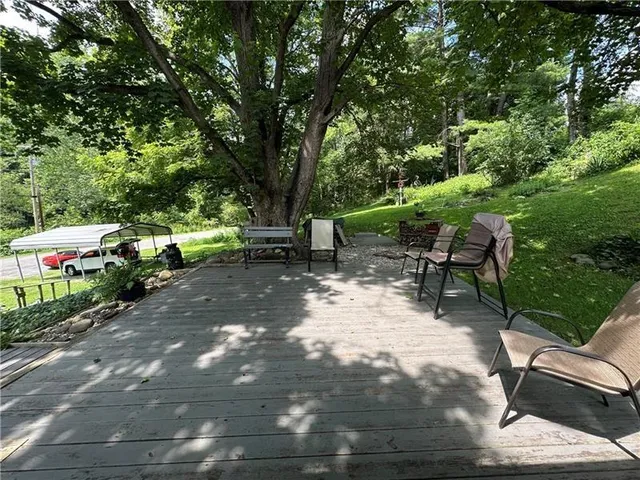 a view of an outdoor sitting area with chairs