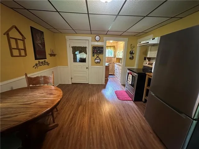 a bed room with a bed and a window