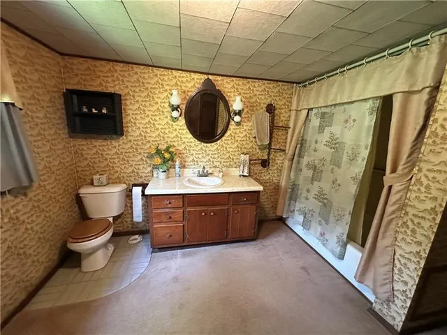 a view of a hallway with windows