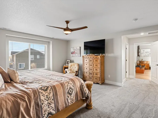 a bathroom with a sink vanity and a mirror