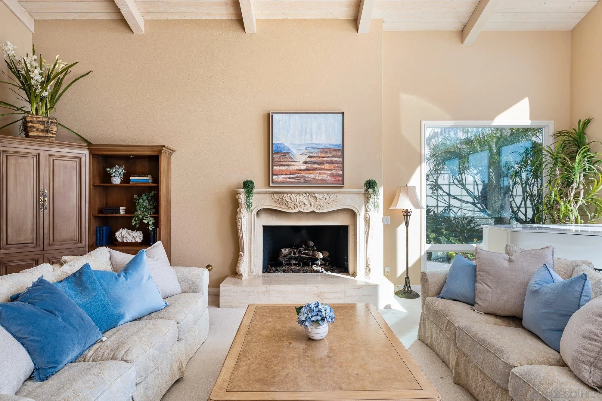 2 The Point Coronado, CA 92118 - Photo 11 of 54 a living room with furniture and a fireplace