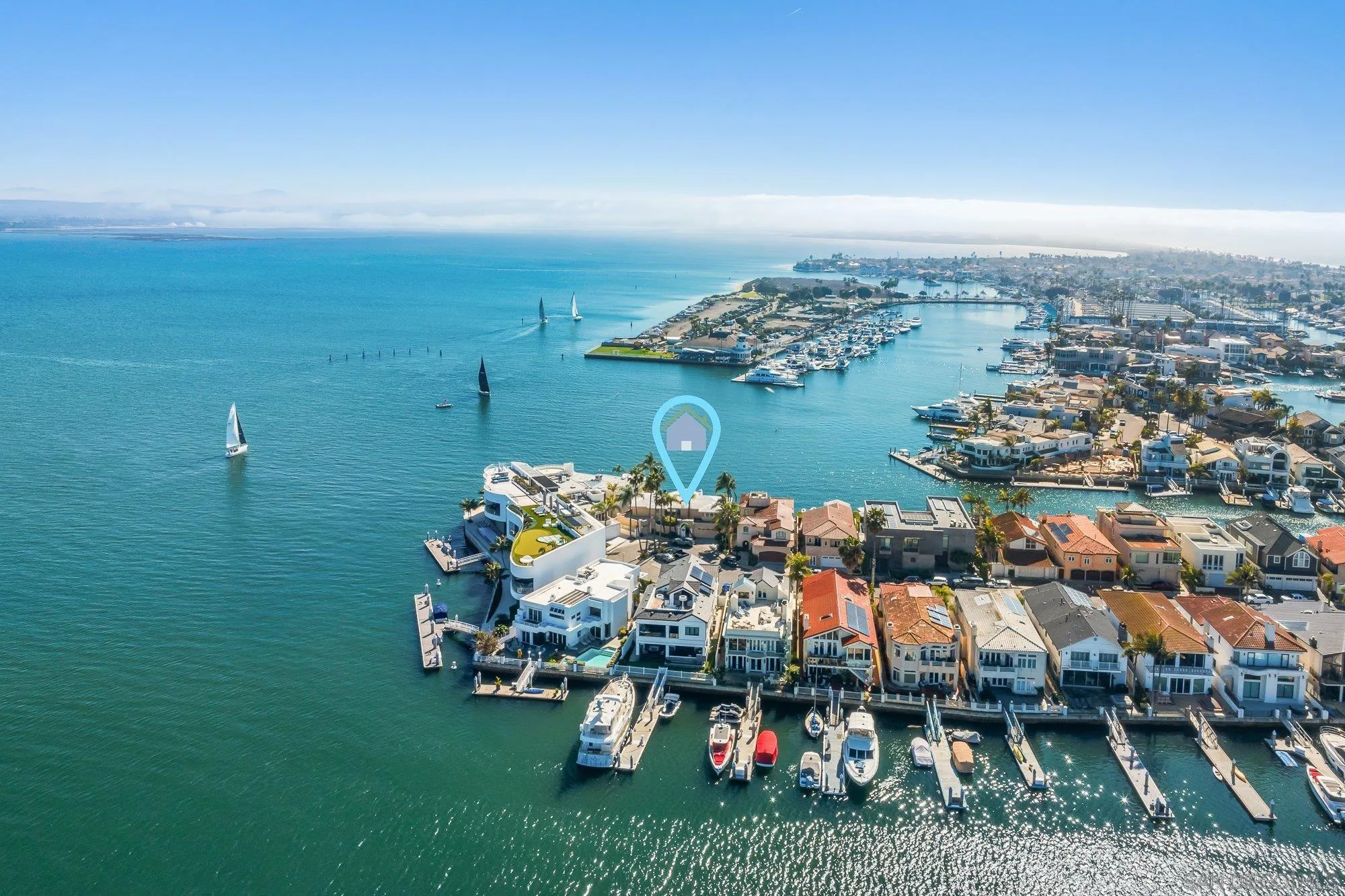 2 The Point Coronado, CA 92118 - Photo 2 of 54 an aerial view of a house with a ocean view